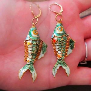 Fish Earings Bran New! super cool made very well